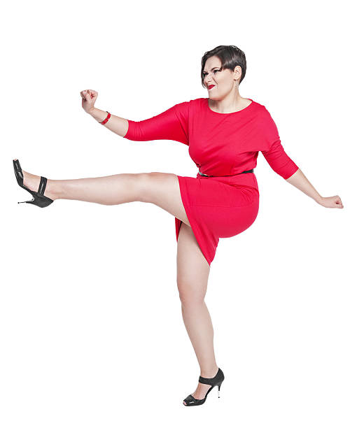 istock Beautiful plus size woman fighting off something isolated 479317002