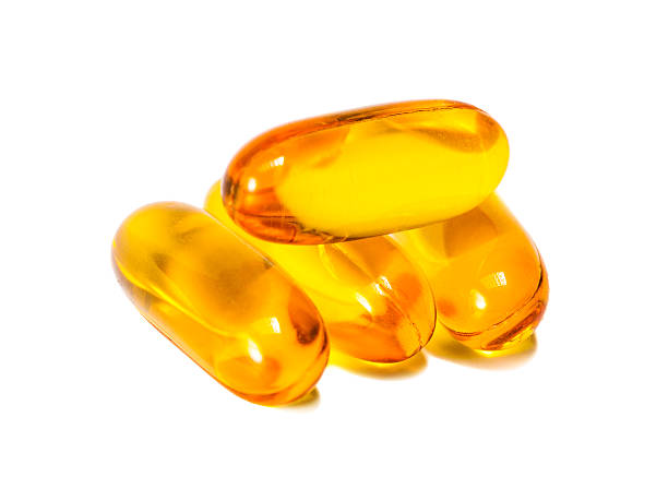 istock Fish oil capsules isolated on white background 479317596