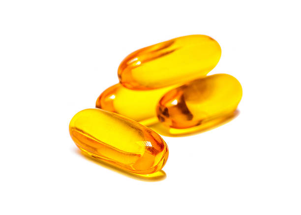 istock Fish oil capsules isolated on white background 479317602