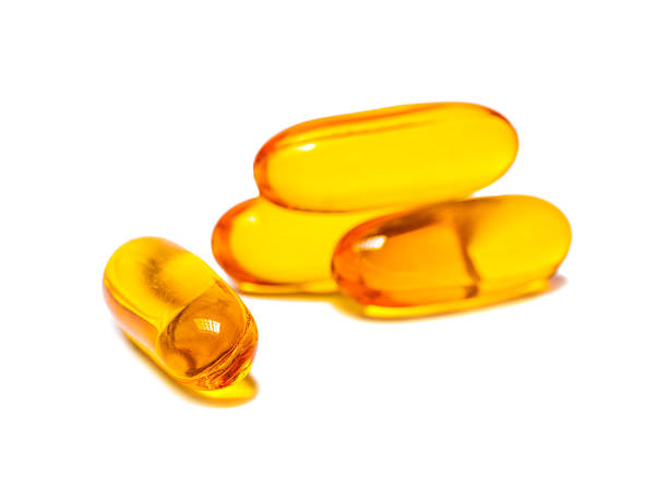 istock Fish oil capsules isolated on white background 479317604