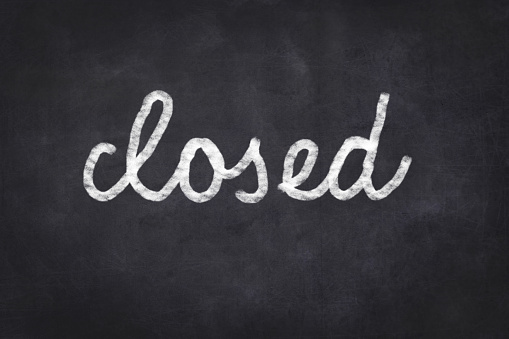 closed handwritten  - black chalkboard with white text
