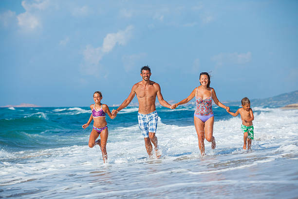 istock Family on the beach 479319680