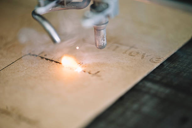 istock Industrial laser engraving on a paperboard 479324358