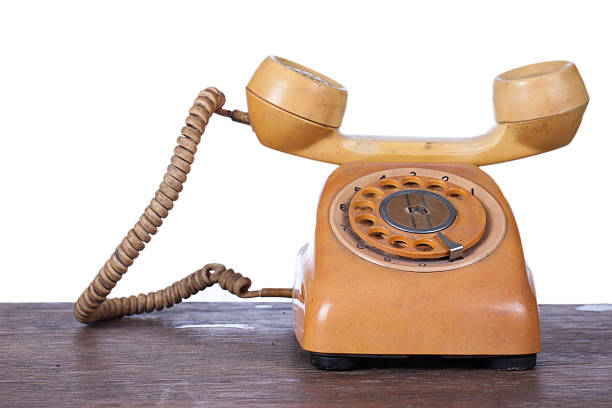 istock Old telephone on wood table. 479328203