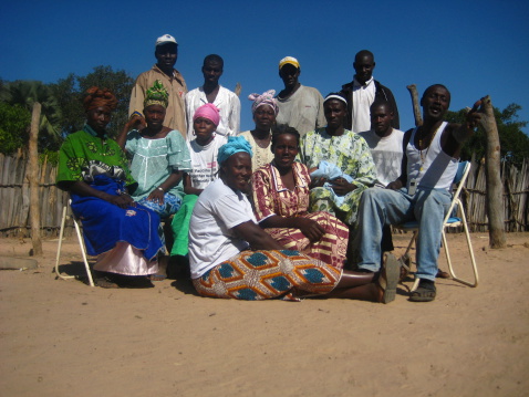 Buram,Gambia-January 5,2009: Adults from a whole african family coming together for a portrait.This picture was taken in rural area of Gambia.