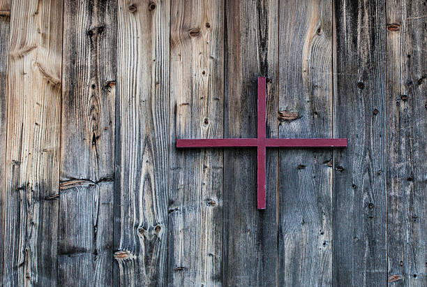 istock red cross on barn wood 479337276