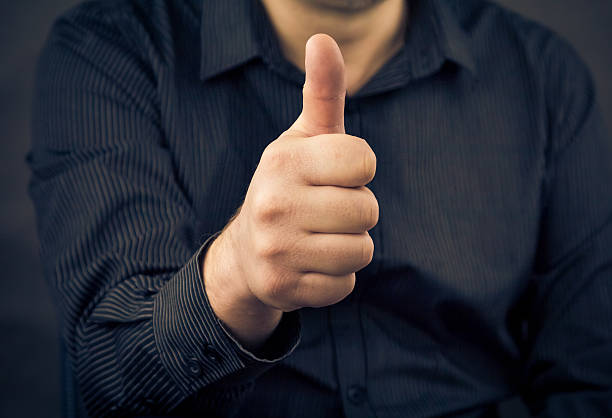 istock Closeup man hand showing thumbs 479339349