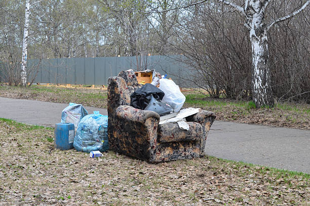 istock Old armchair and trash in a park 479339712