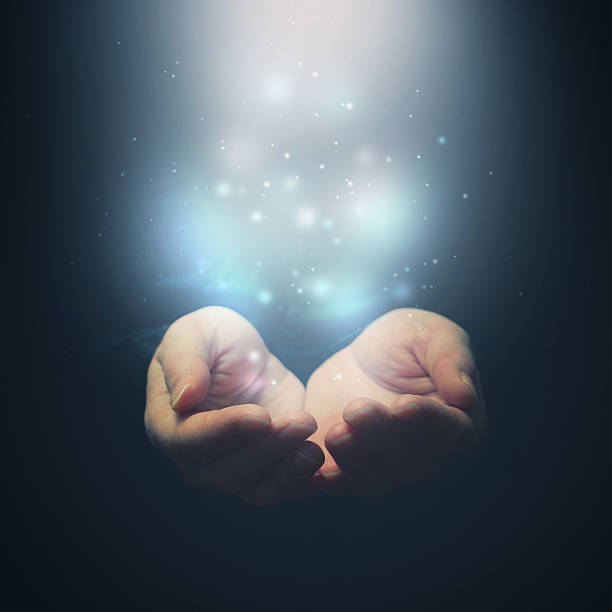 istock Open hands with magic particles. Holding, giving, showing concep 479341619