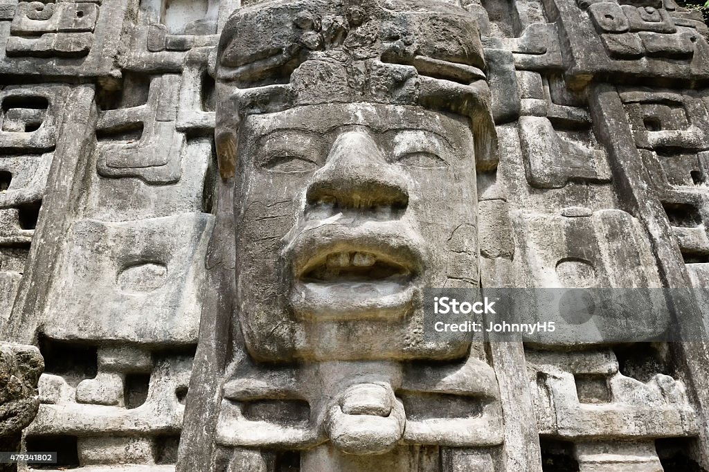 Close Up Mask Temple Close up of Maya Mask Temple located in the forest of Belize. Mayan Stock Photo