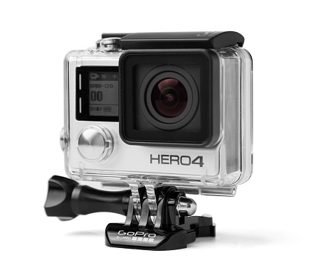 Canton, GA, USA - June 29, 2015 A GoPro Hero 4.  The gopro hero is a ultra small hd camera capable of capturing 4k footage and up to 240 frames per second.  The GoPro is isolated on  a white background.
