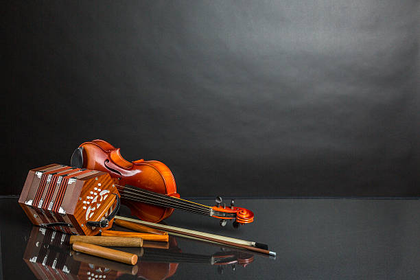 A group of latin style musical instruments on a black background