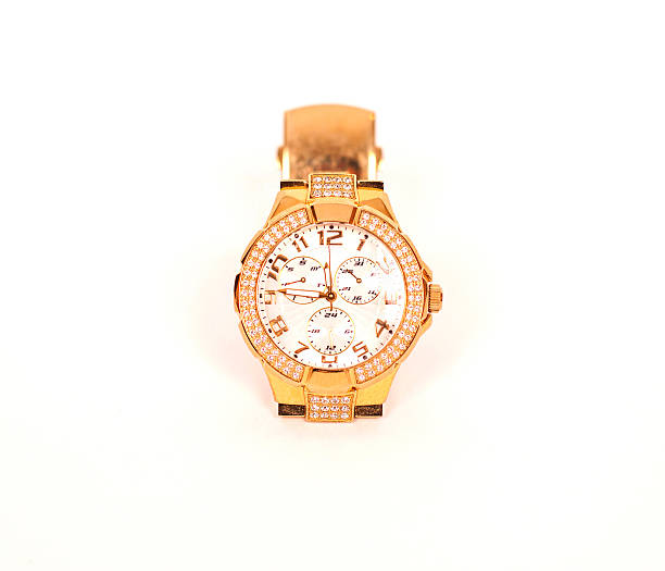 istock golden watch isolated on a white background 479351971