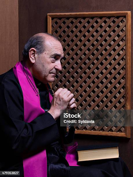 Priest Stock Photo - Download Image Now - Confession Booth, Catholicism, 65-69 Years