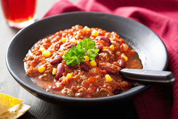 istock mexican chili con carne in black plate 479354351