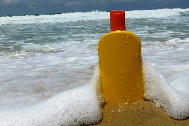 istock Suntan lotion at the beach 479355368
