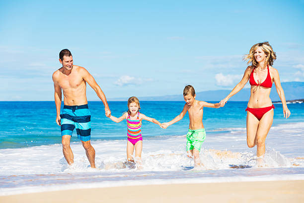 istock Happy Family at the Beach 479358802