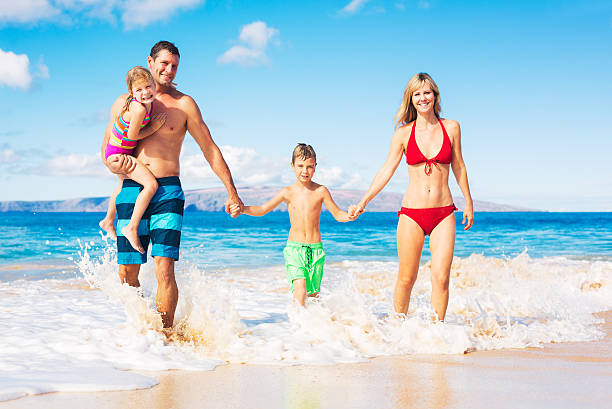 istock Happy Family at the Beach 479358920