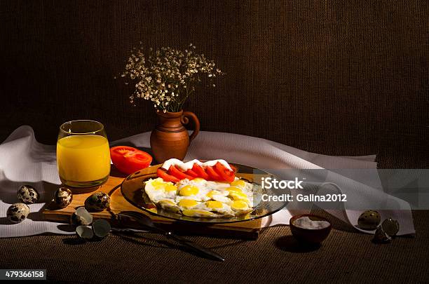 Fried Quail Eggs With Tomatoes And Mayonnaise Stock Photo - Download Image Now - 2015, Beauty, Cutting Board