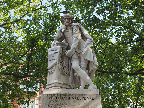 Statue of William Shakespeare built in 1874 in Leicester Square in London, UK