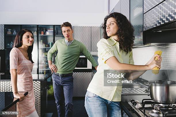 Three Friends In Kitchen Stock Photo - Download Image Now - 20-24 Years, 20-29 Years, Adult