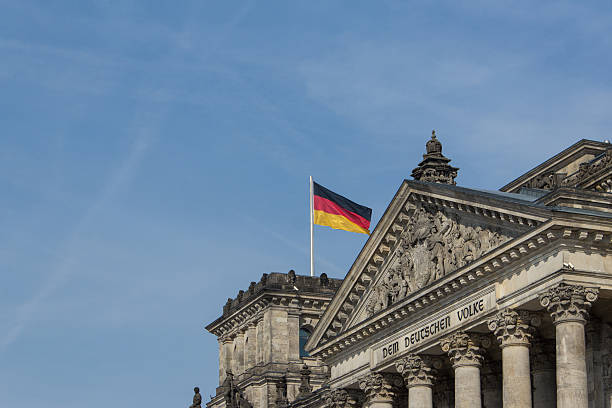 istock German flag on parliametn building ( Reichstag), berlin, germany 479378644