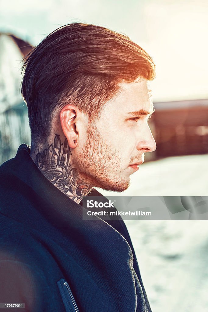 Profile View Of Young Man With Tattoos On His Neck Stock Photo - Download  Image Now - Tattoo, Human Face, Men - iStock