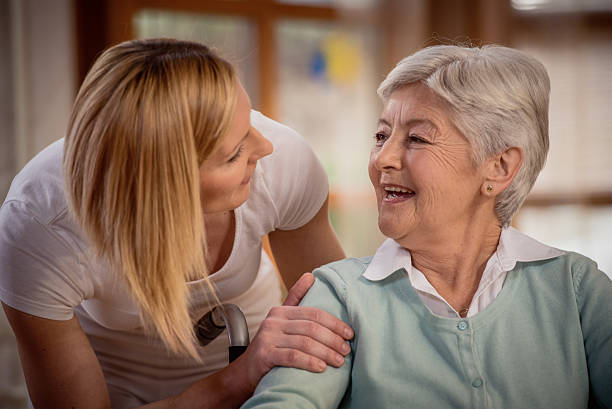 istock Nurse during home visit with senior woman 479381692