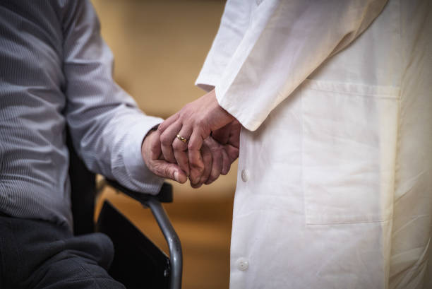 istock Nurse during home visit with senior man 479392986
