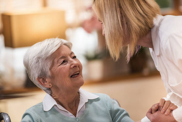 istock Nurse during home visit with senior woman 479392992
