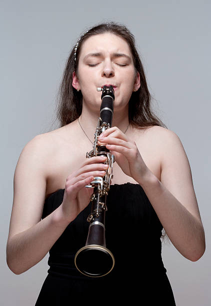 istock Young Female Musician Playing Clarinet 479394479
