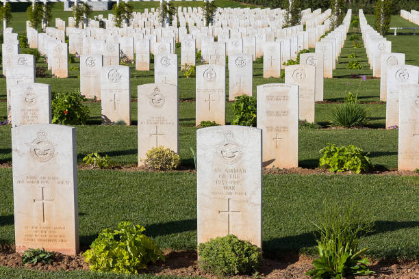 istock White headstones at war cemetery 479394935