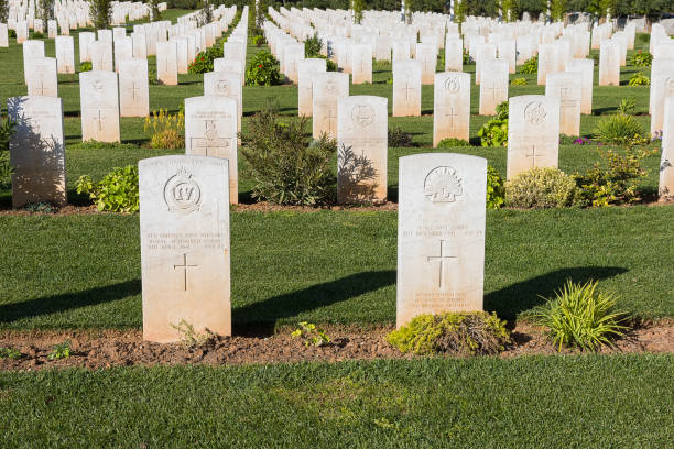 istock White headstones at war cemetery 479394977