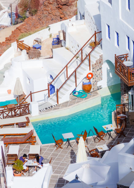 istock Tables and chairs on a balcony at Santorini, Greece 479398807