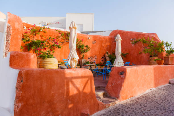 istock Tables and chairs on a balcony at Santorini, Greece 479398823
