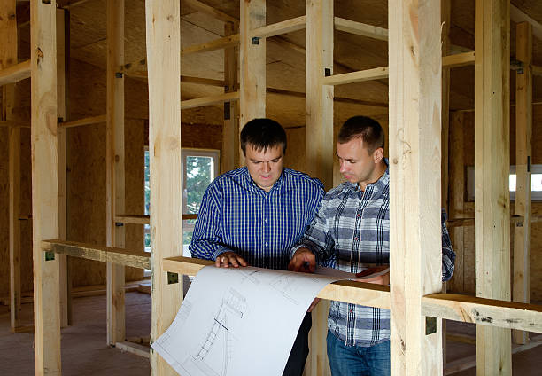 istock Two builders in a new build house 479399674
