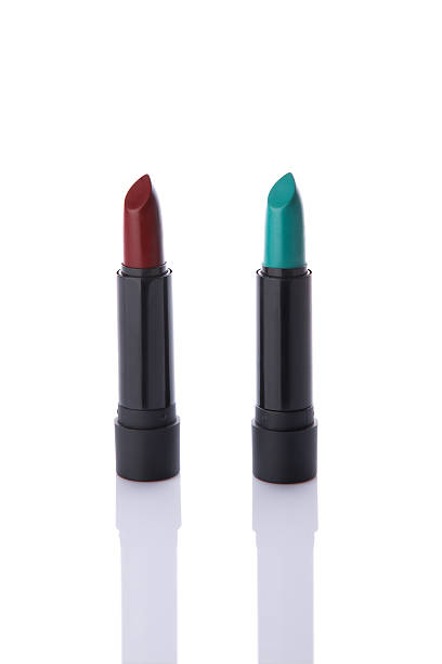 istock Two trendy lipsticks in brick red and teal colors 479400006