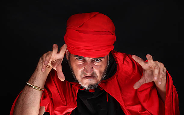 istock Hypnotist or sorcerer is doing hypnosis or magic 479400524