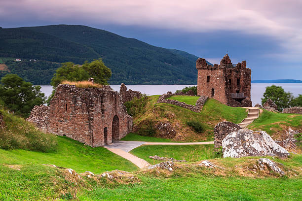 The Loch Ness Dusk on a famous Scottish castle scottish highlands photos stock pictures, royalty-free photos & images
