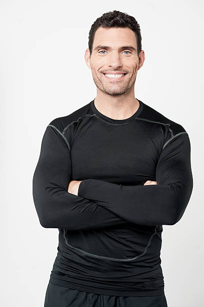 istock Happy male athlete with folded arms 479408506