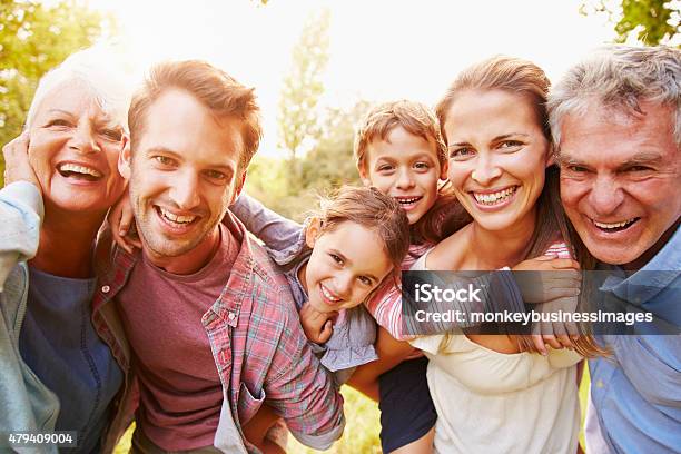 Multigeneration Family Having Fun Together Outdoors Stock Photo - Download Image Now