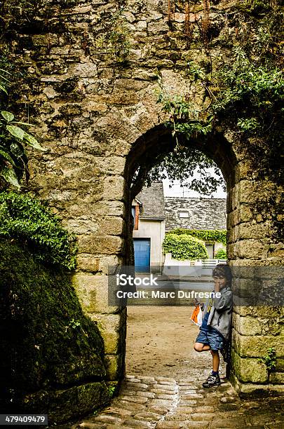Kid In A Arch Door Stock Photo - Download Image Now - Brittany - France, Child, Guerande