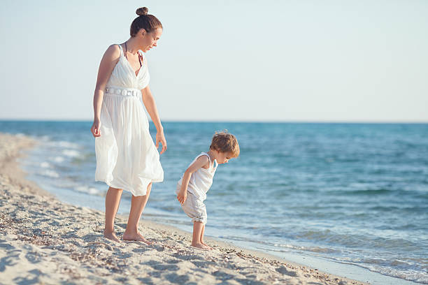 istock Mother and Son on the Beach 479413374