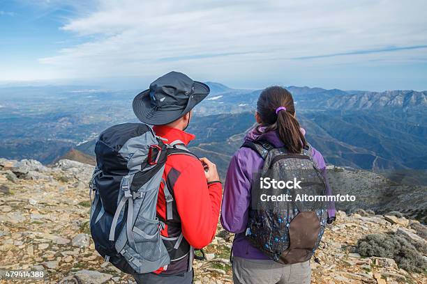 Couple Enjoying The Mountains Stock Photo - Download Image Now - 2015, Active Lifestyle, Activity