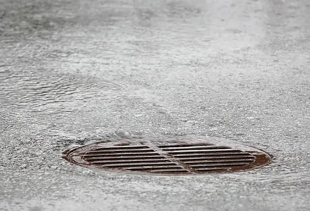 Photo of Manhole Grate, Heavy Rain