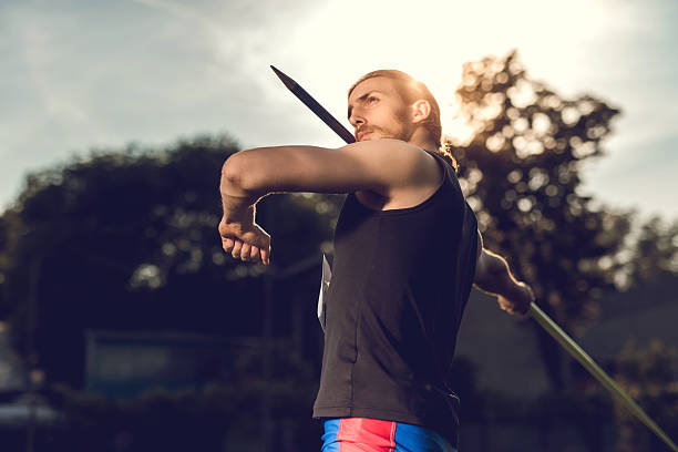 istock Determined man about to throw a javelin. 479421874