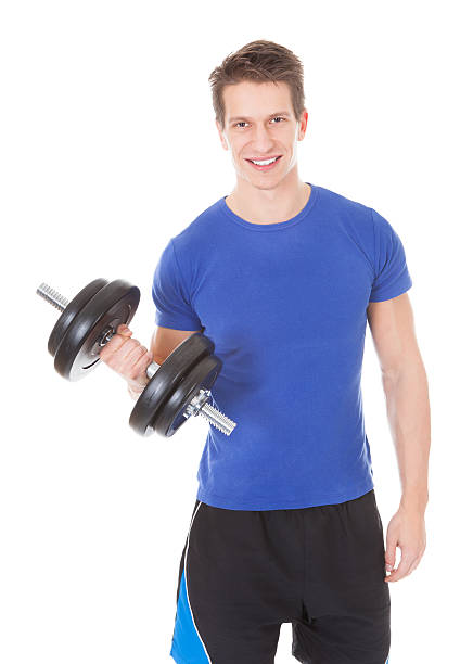 istock Young Man Exercising With Dumbbells 479422574