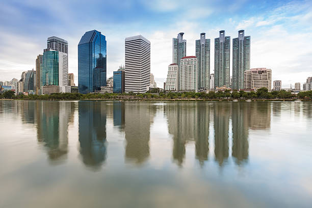 istock Bangkoks business district during sunset with water reflection Thailand 479423654