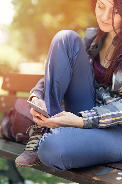 istock Young girl texting on a smart phone 479426070
