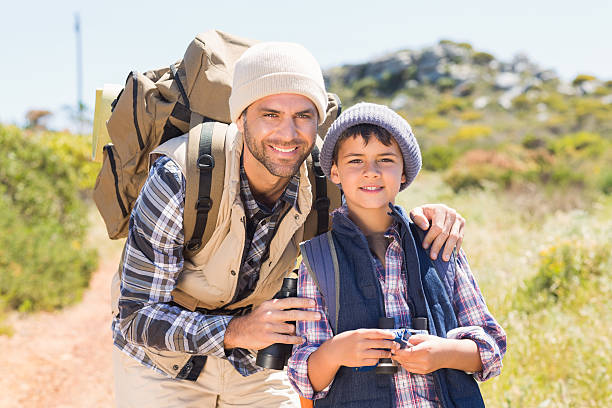 istock Father and son hiking in the mountains 479426326